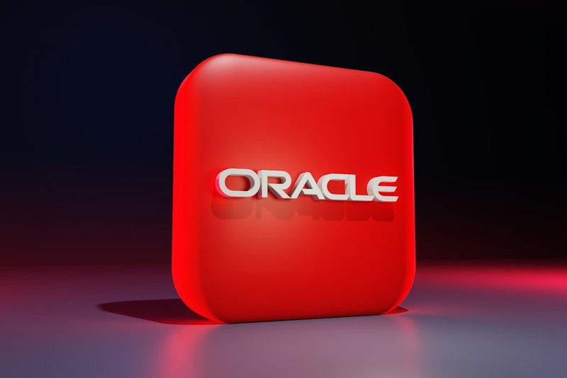 The Oracle corporate logo rendered in red on a dark background