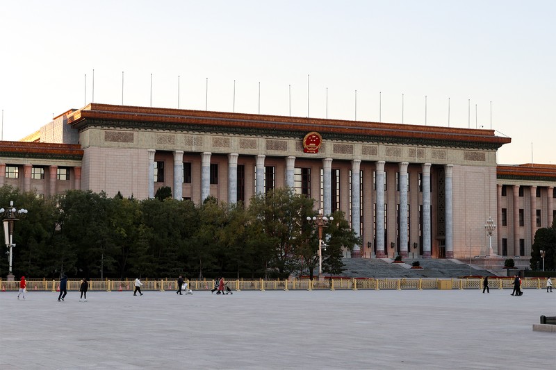 The Great Hall of the People in Beijing, China, with its grand neoclassical facade and red-tiled roof